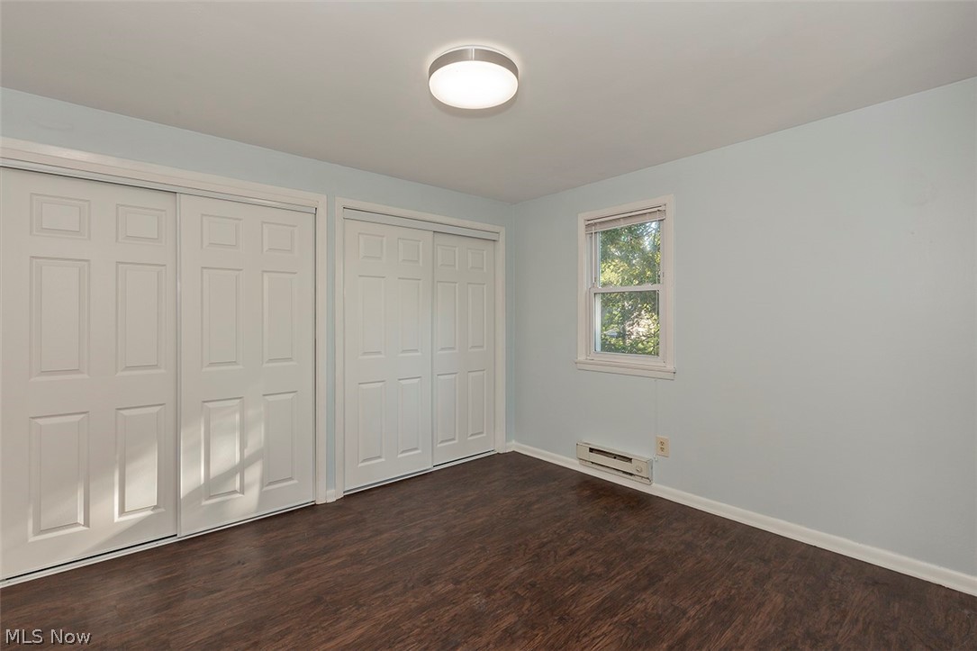 1877 Lawnway Road South Euclid, OH 44121 - Photo 17 of 34 And now to the second Floor. This spacious back Bedroom has loads of closet space and newer flooring. There is a nice view of the backyard from this bedroom.