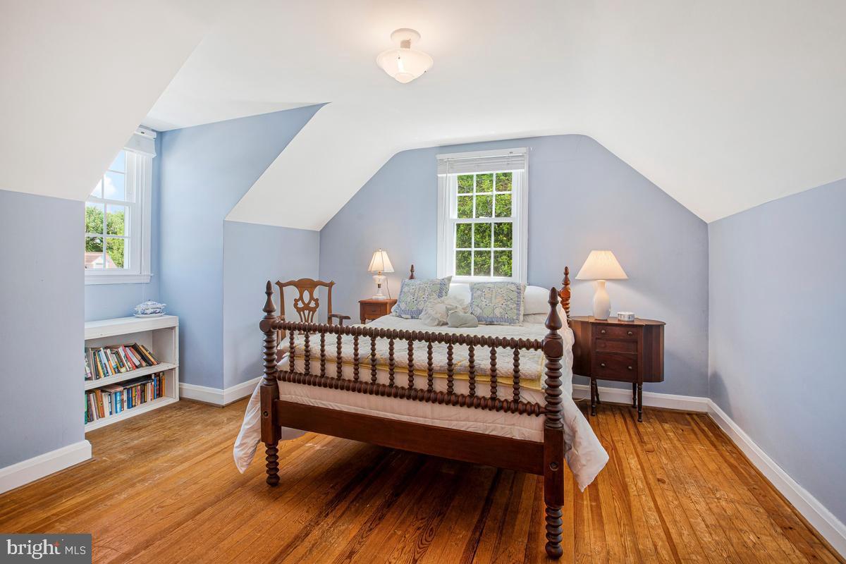 601 Forest View Road Linthicum Heights, MD 21090 - Photo 27 of 37 a bedroom with furniture and a window