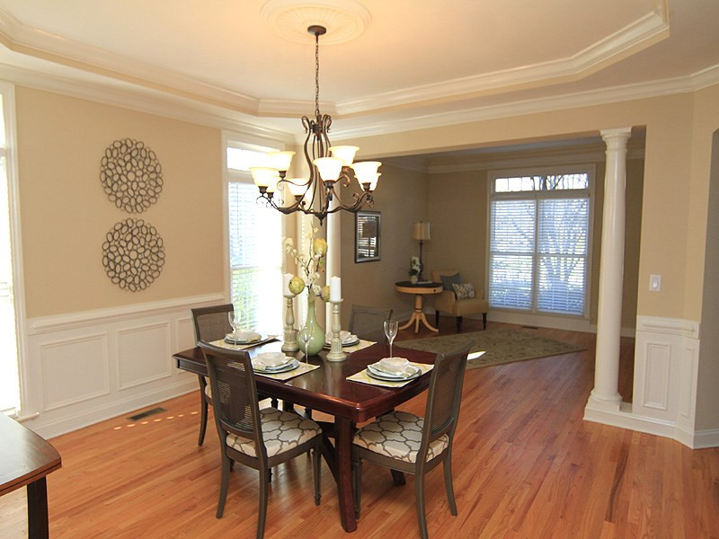 12308 Canolder Street Raleigh, NC 27614 - Photo 7 of 25 You can see how the dining room and living room flow. Columns accent the division between rooms. Dining room/Living Room