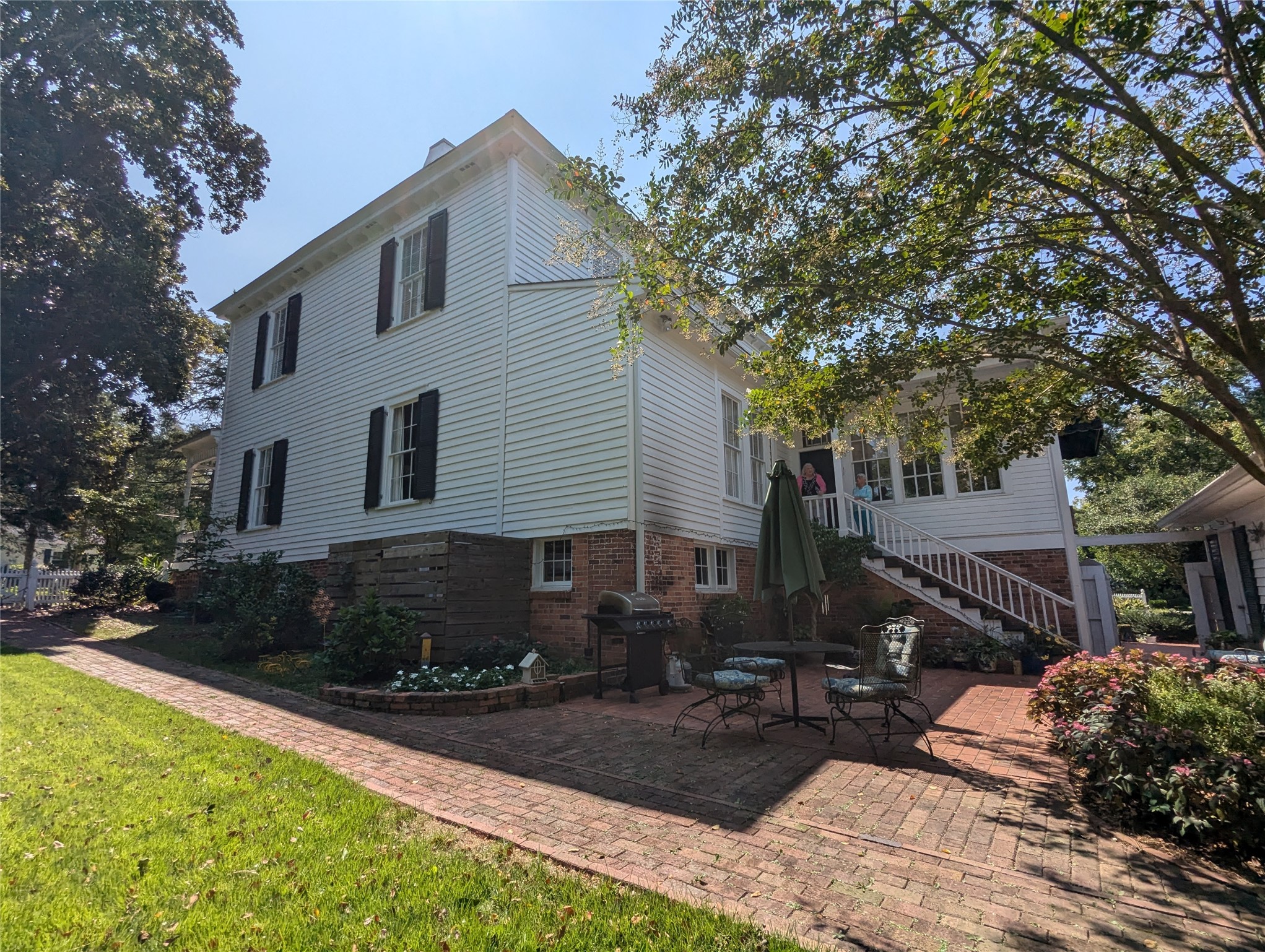414 Spring Street Washington, GA 30673 - Photo 41 of 42 a front view of a house with a yard