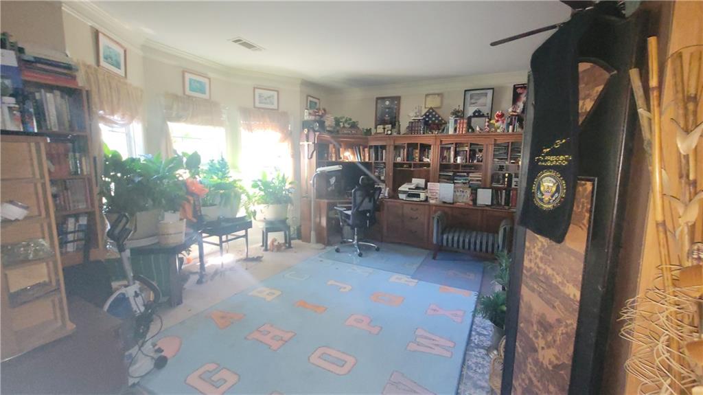2182 Ann Lane Lithia Springs, GA 30122 - Photo 4 of 8 a living room with furniture and a window
