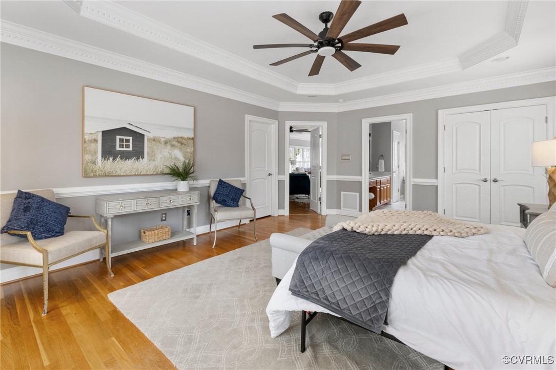 2311 Kings Lynn Road Midlothian, VA 23113 - Photo 24 of 50 a spacious bedroom with a bed a couch and dresser