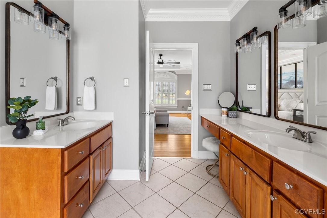 2311 Kings Lynn Road Midlothian, VA 23113 - Photo 27 of 50 a spacious bathroom with a double vanity sink mirror and shower