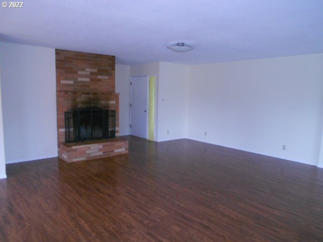 5355 Southwest River Road Hillsboro, OR 97123 - Photo 21 of 24 a view of wooden floor and brick walls