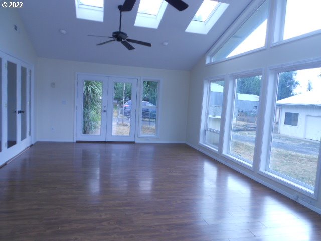 5355 Southwest River Road Hillsboro, OR 97123 - Photo 23 of 24 a view of an empty room with wooden floor and a window