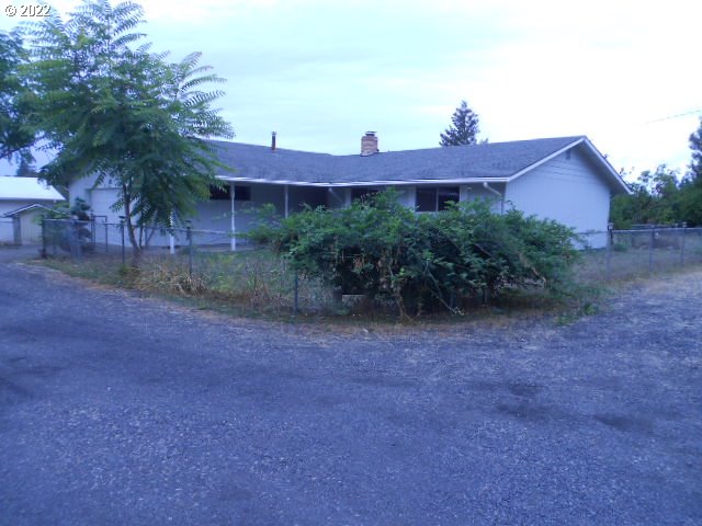 5355 Southwest River Road Hillsboro, OR 97123 - Photo 3 of 24 a view of a house with a yard