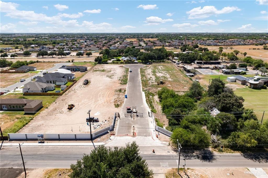 905 Mountain Road Mission, TX 78573 - Photo 4 of 8 an aerial view of residential houses with outdoor space