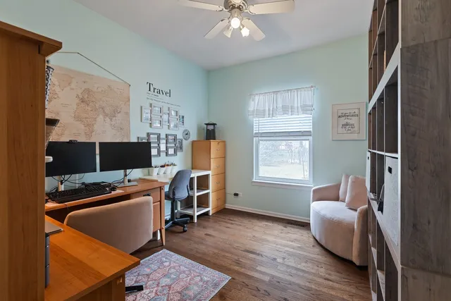 a bedroom with furniture and a window