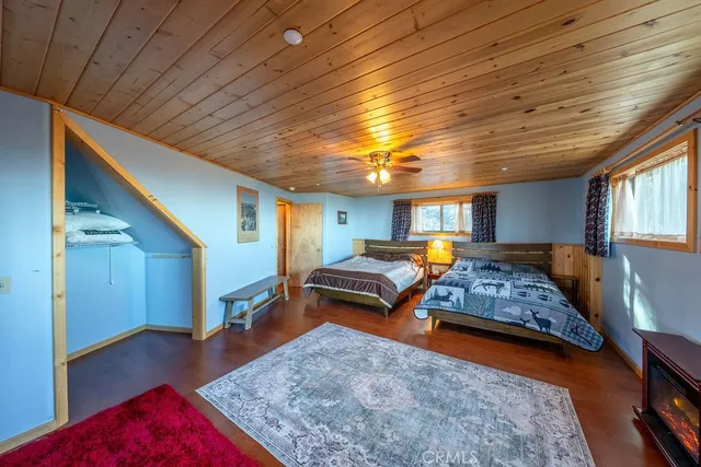 a view of a kitchen with stove and cabinets