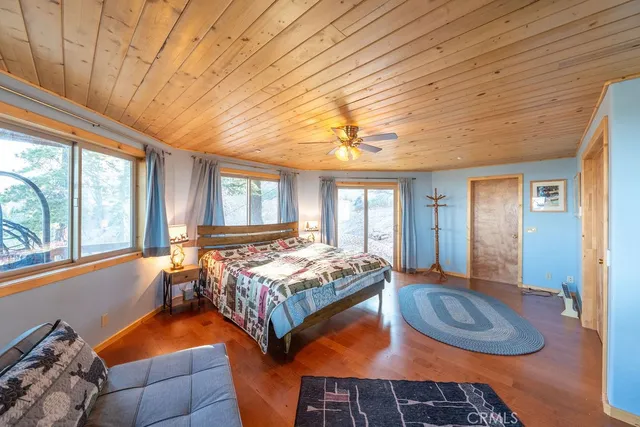 a bathroom with a sink mirror and toilet