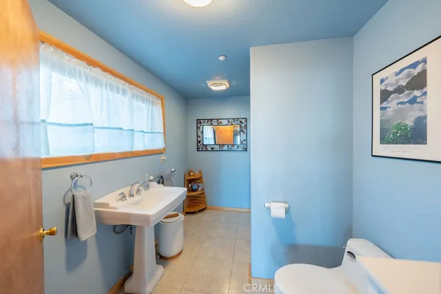 a view of balcony with a potted plant and stairs