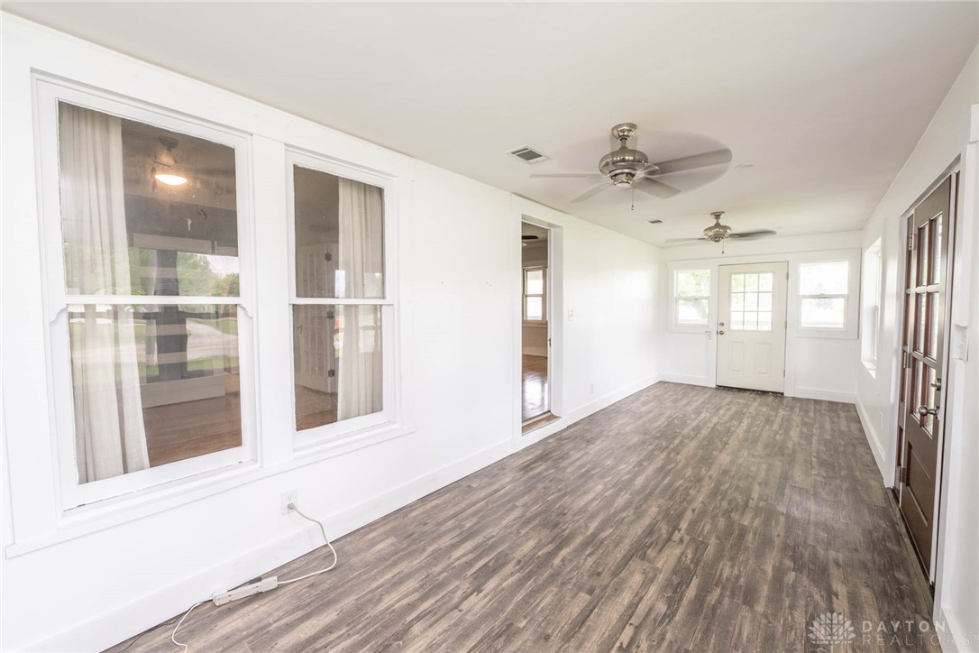 190 Swailes Road Troy, OH 45373 - Photo 26 of 82 This bright sunroom offers generous natural light and durable flooring, ideal for a variety of uses.