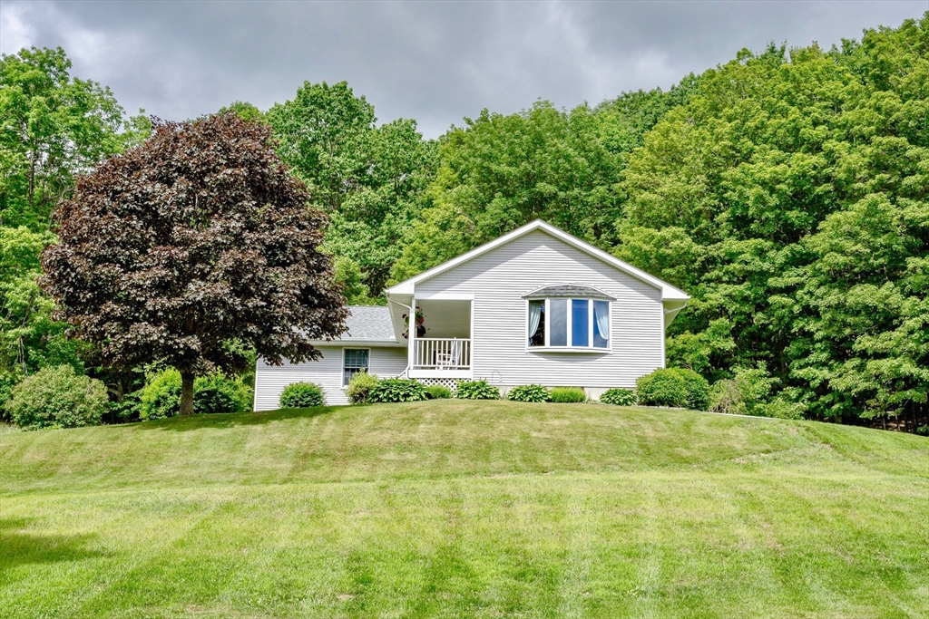 85 Lyman Road Chester, MA 01011 - Photo 1 of 34 a house view with a outdoor space