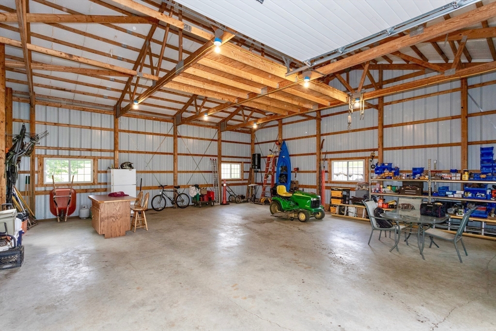 85 Lyman Road Chester, MA 01011 - Photo 29 of 34 a view of a garage with a couch