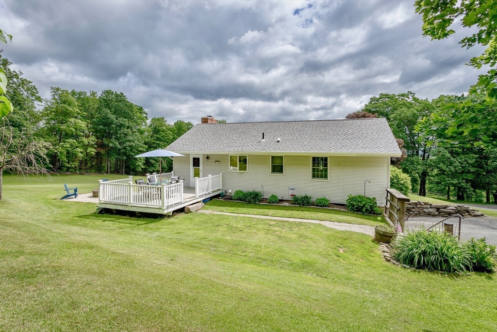 85 Lyman Road Chester, MA 01011 - Photo 33 of 34 a view of a house with pool and a yard