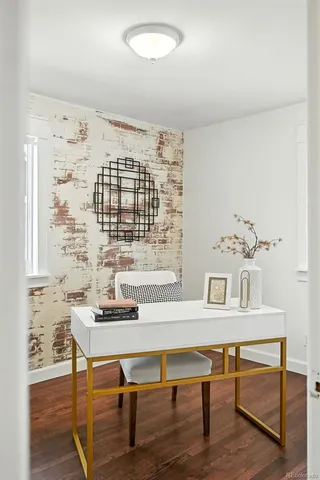 a workspace with furniture and window