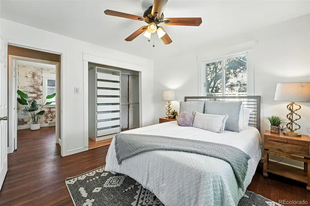 a bedroom with a bed furniture and a window