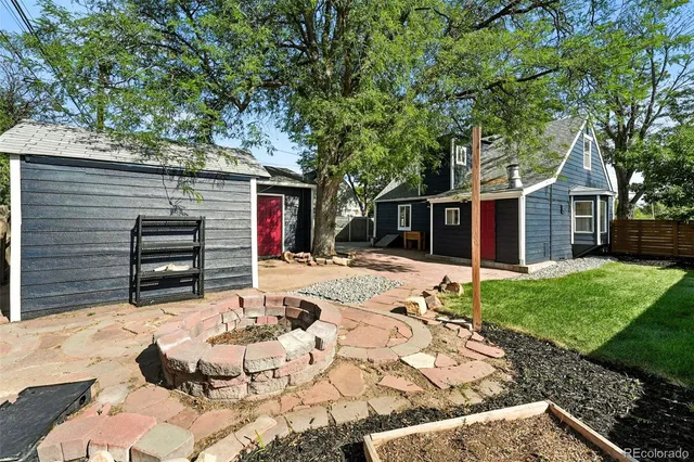a backyard of a house with seating space