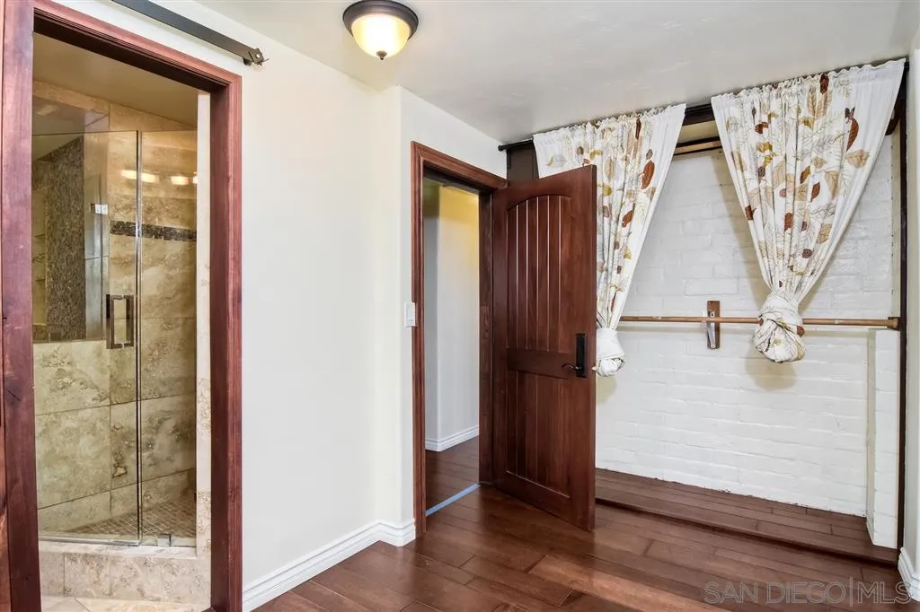 856 Capri Road Encinitas, CA 92024 - Photo 18 of 25 wooden floor with staircase