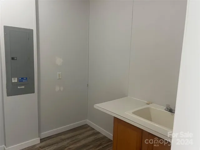 a bathroom with a sink and vanity