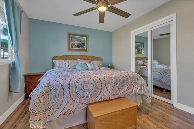 a bathroom with a sink a mirror and shower