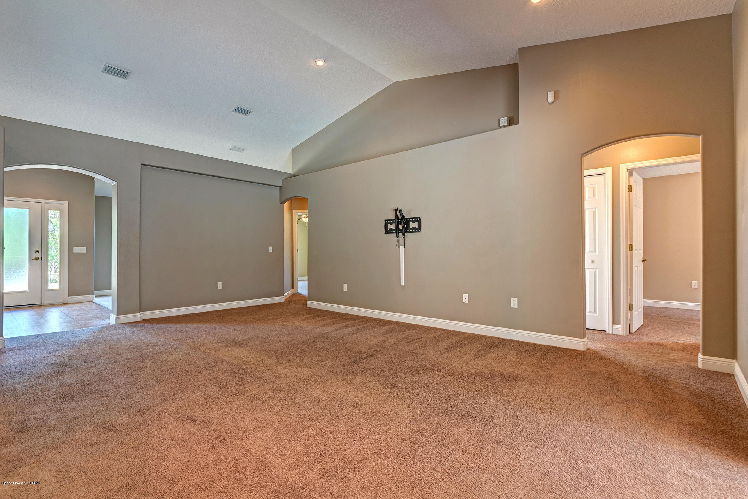 1306 Scranton Street Southwest Palm Bay, FL 32908 - Photo 17 of 36 a view of an empty room with a window