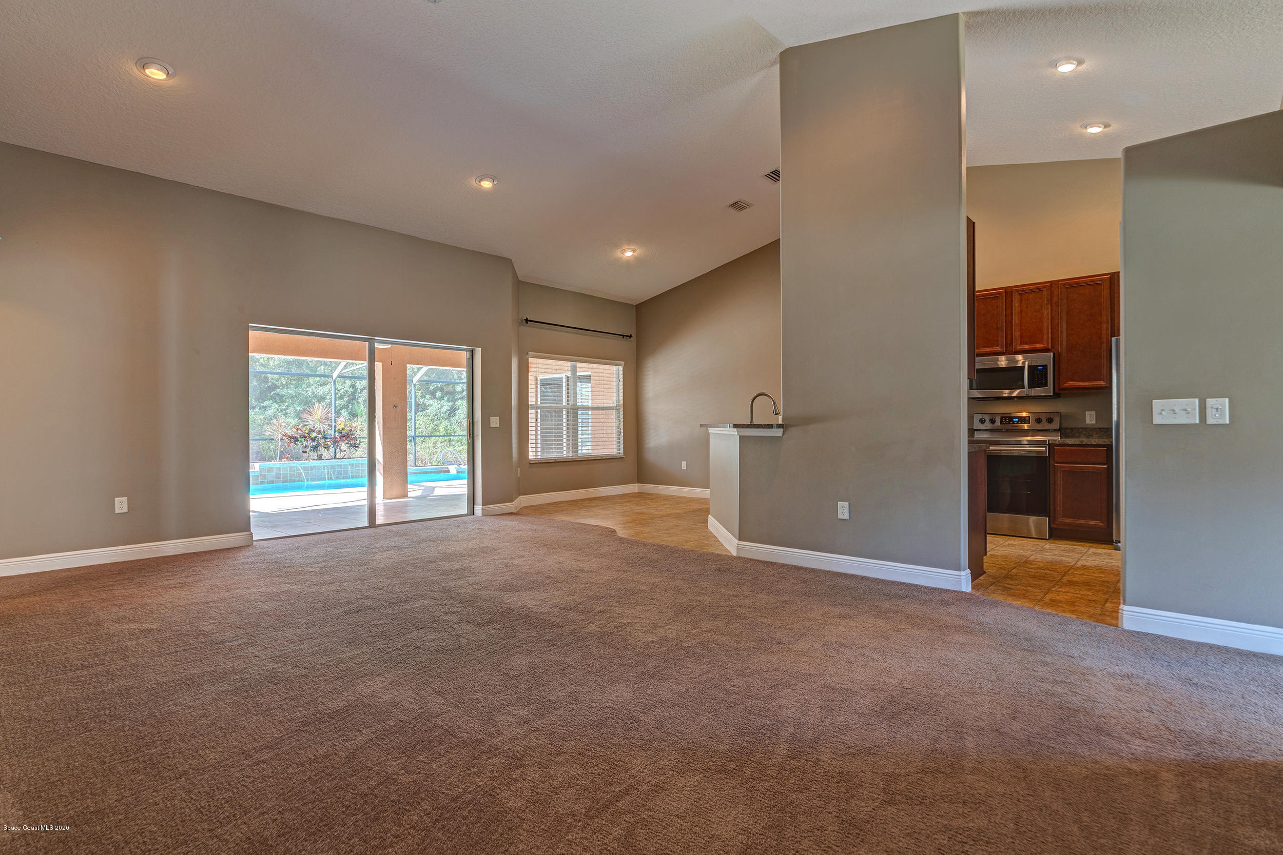 1306 Scranton Street Southwest Palm Bay, FL 32908 - Photo 19 of 36 a view of an empty room with a window