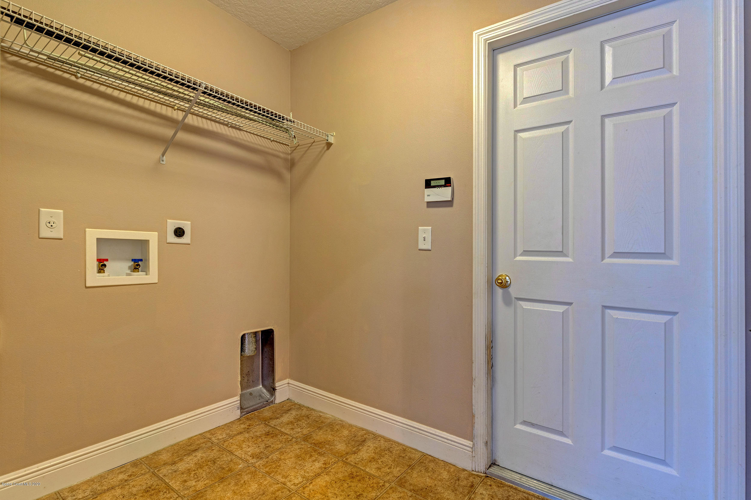 1306 Scranton Street Southwest Palm Bay, FL 32908 - Photo 25 of 36 a view of room with window