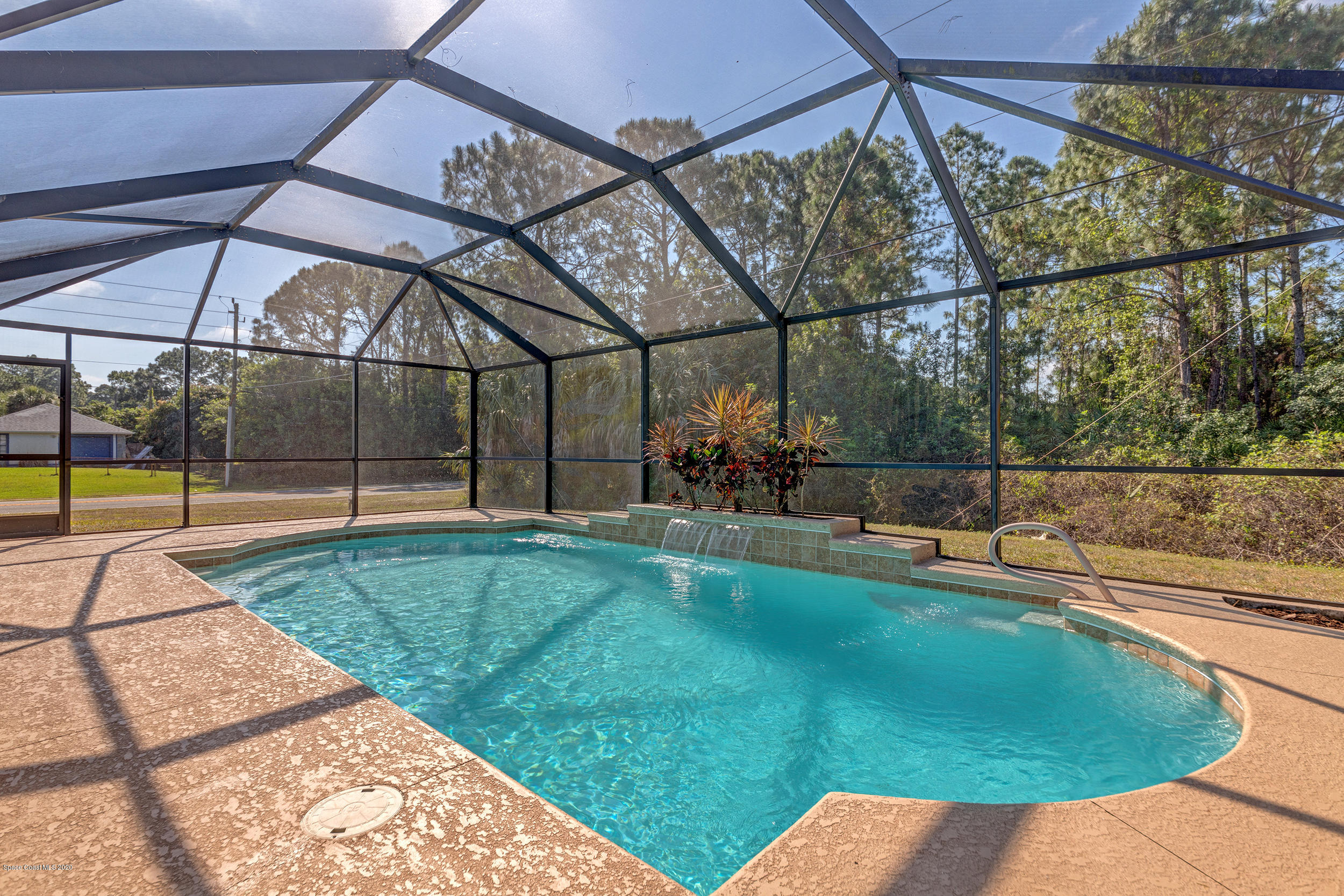 1306 Scranton Street Southwest Palm Bay, FL 32908 - Photo 32 of 36 a view of a backyard with sitting area