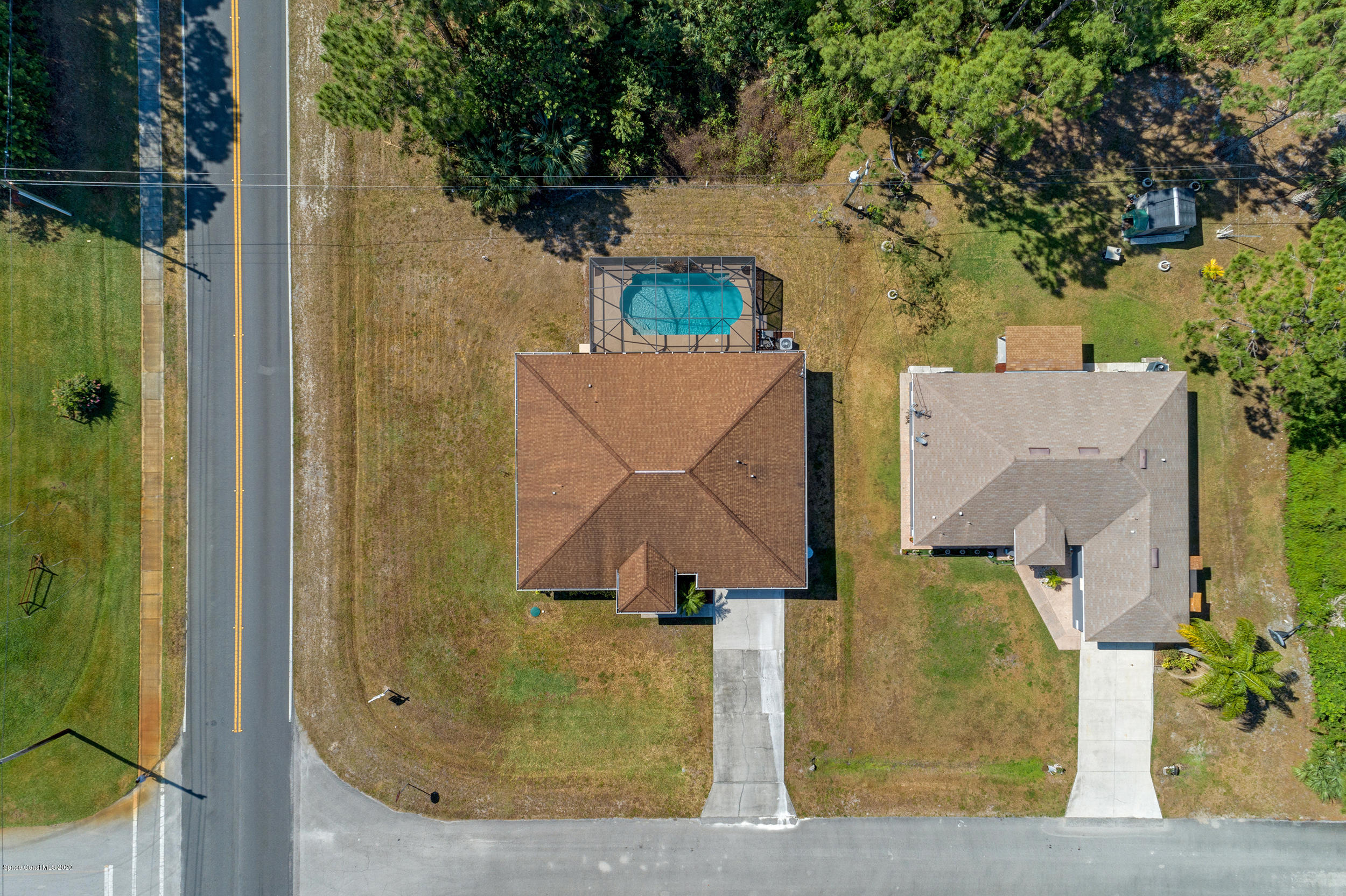 1306 Scranton Street Southwest Palm Bay, FL 32908 - Photo 35 of 36 an aerial view of a house with swimming pool