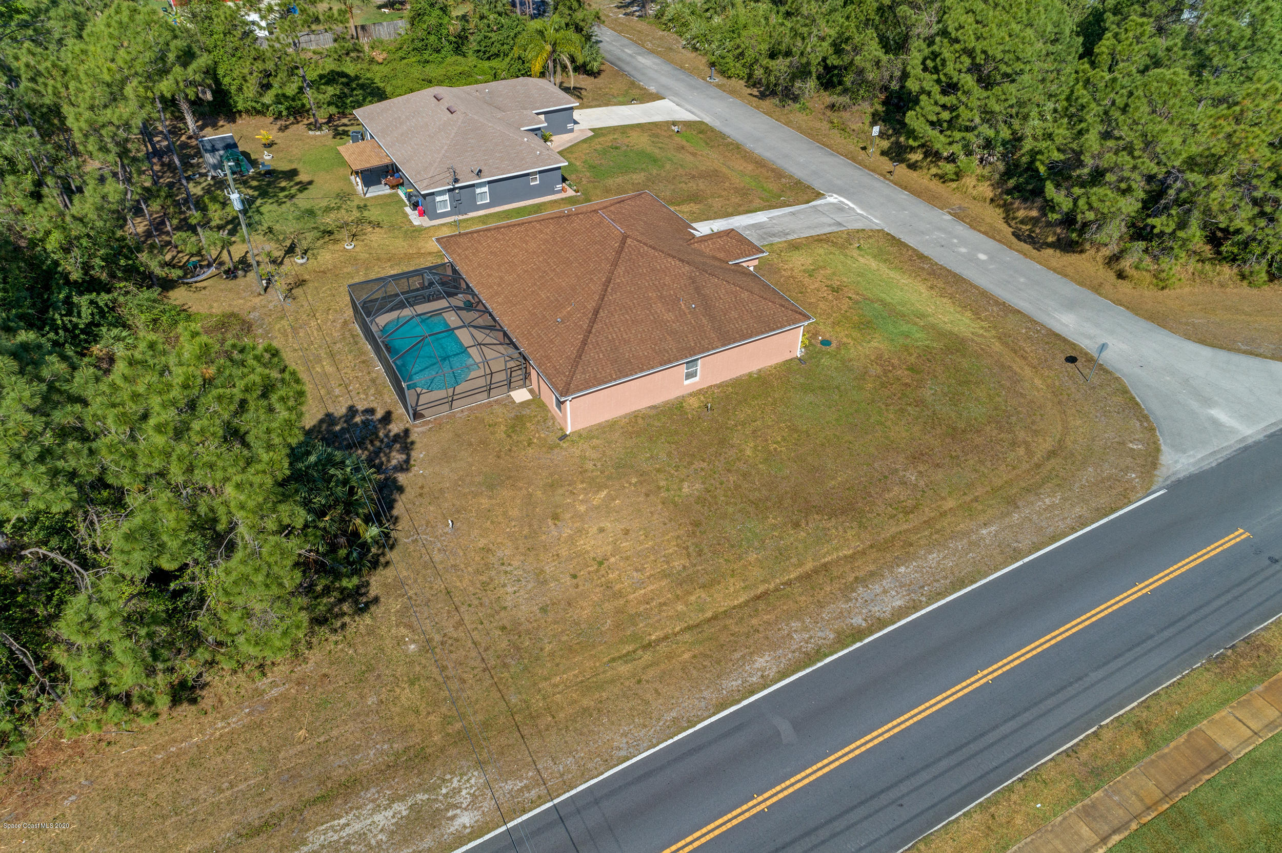 1306 Scranton Street Southwest Palm Bay, FL 32908 - Photo 36 of 36 view of a pool with a yard