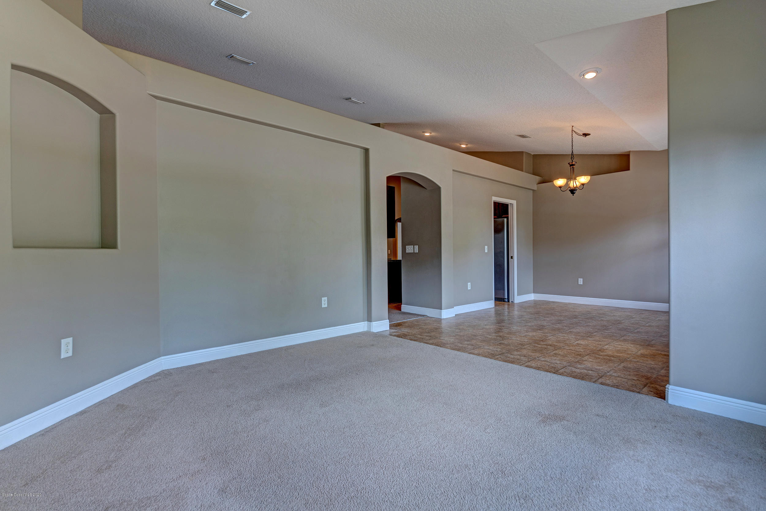 1306 Scranton Street Southwest Palm Bay, FL 32908 - Photo 8 of 36 a view of a livingroom and entryway