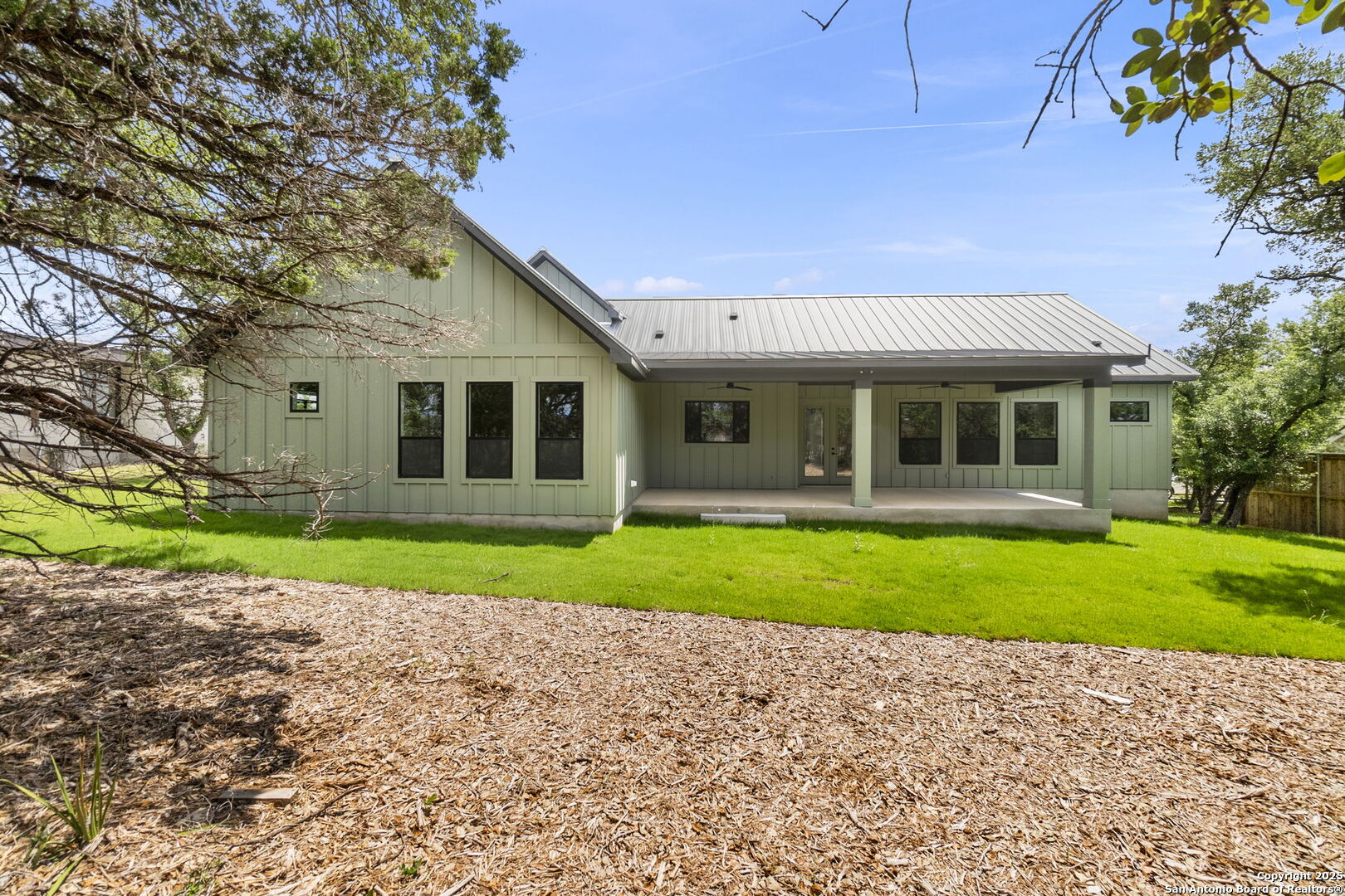 32 Peace Pipe Wimberley, TX 78676 - Photo 2 of 9 a view of a house with a yard