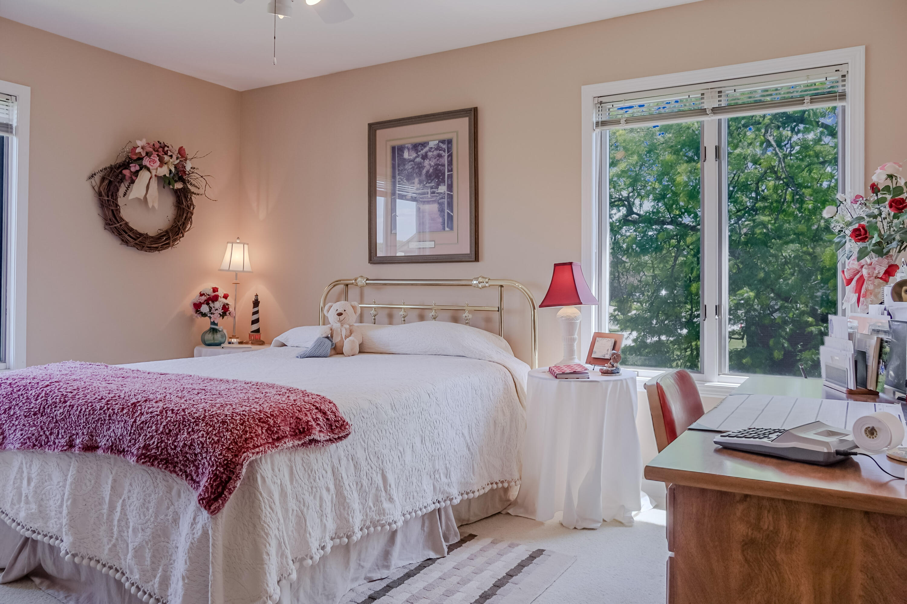5065 Spinnaker Lane, Unit D Crown Point, IN 46307 - Photo 20 of 42 a bedroom with a bed and a chandelier