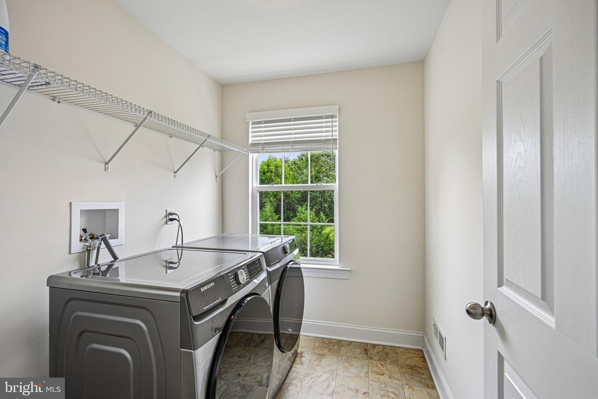 440 Elizabeth Way Hatfield, PA 19440 - Photo 40 of 60 Bright and airy laundry space.