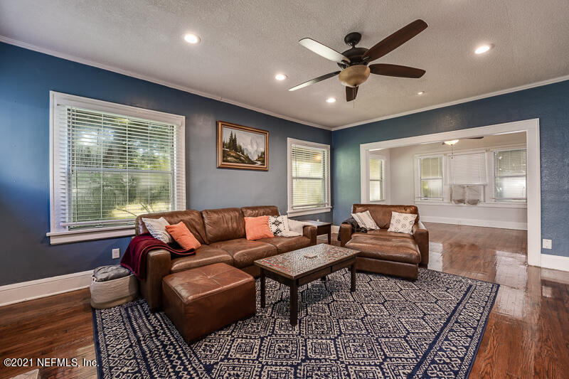 5116 Sunderland Road Jacksonville, FL 32210 - Photo 10 of 33 a living room with furniture and a window