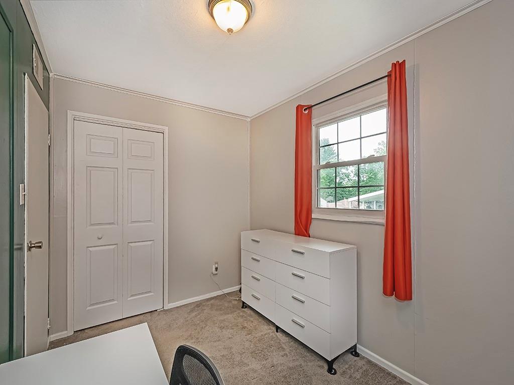 60 Neville Road Beaver, PA 15009 - Photo 22 of 23 a room with a dresser and a window