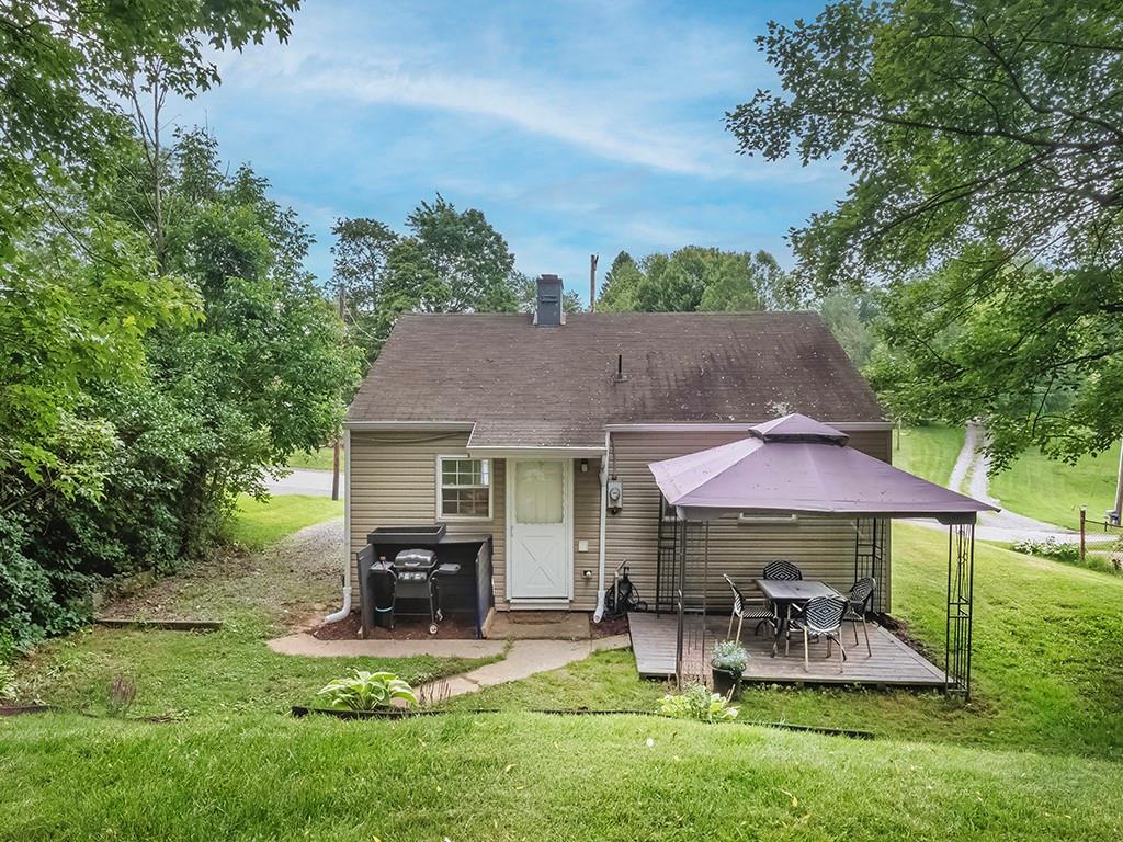 60 Neville Road Beaver, PA 15009 - Photo 3 of 23 a view of house with backyard and outdoor seating