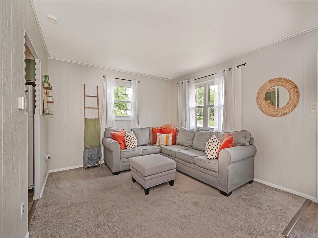 60 Neville Road Beaver, PA 15009 - Photo 9 of 23 a living room with furniture and a window