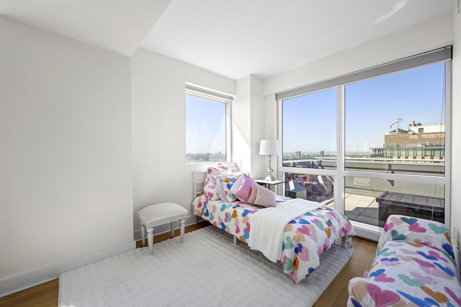 2628 Broadway, Unit 34 Manhattan, NY 10025 - Photo 9 of 9 a bedroom with bed and a window