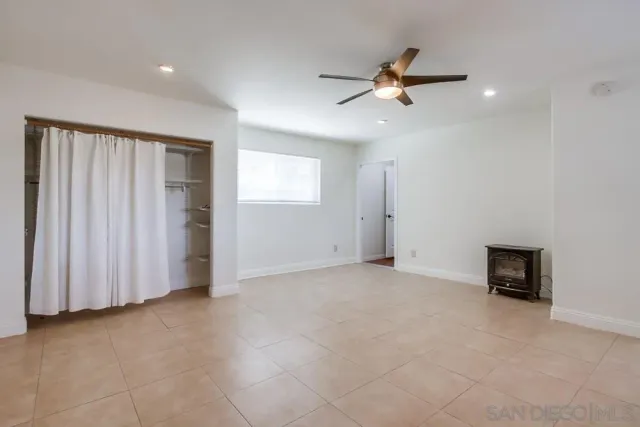a en suite bathroom with a sink and a mirror