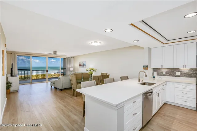 a view of storage and utility room with washer and dryer