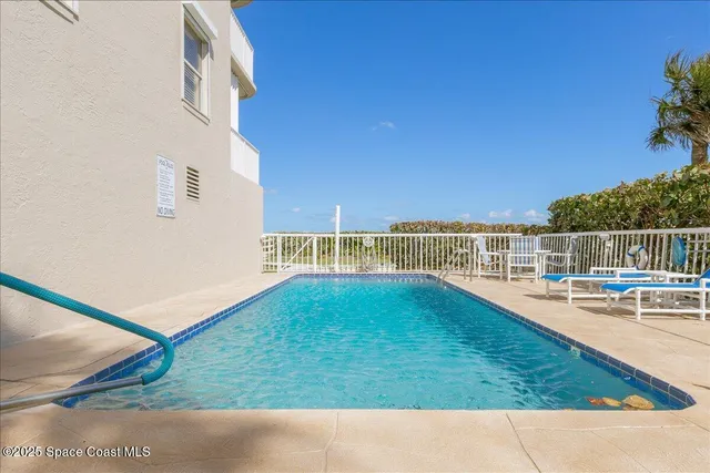 a view of a yard with an outdoor seating and mountain view