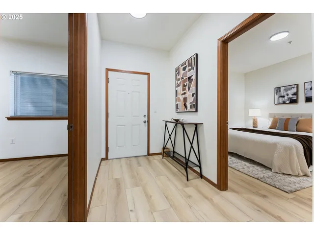 a bedroom with a bed and a view of bathroom