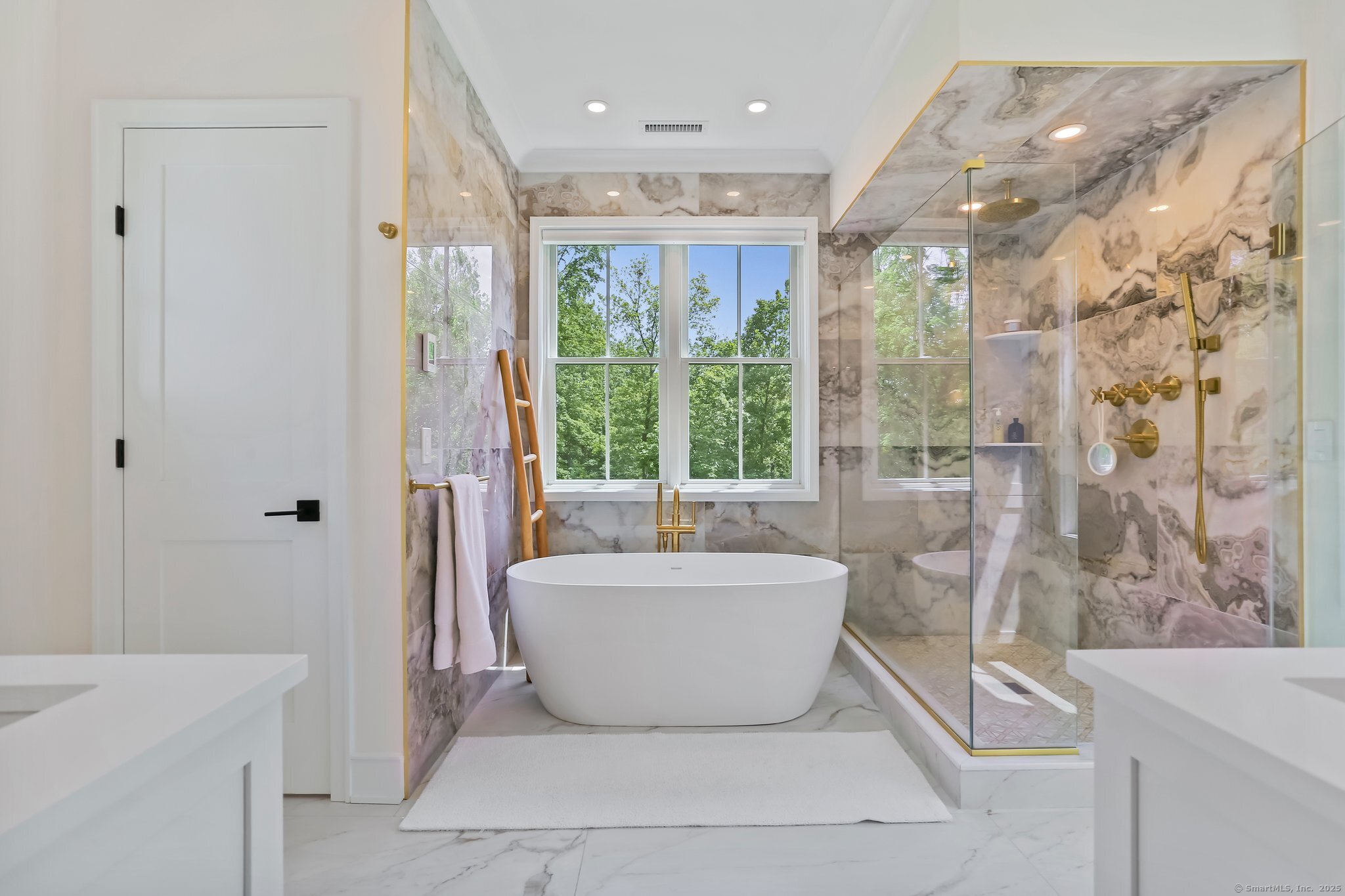 2015 Redding Road Fairfield, CT 06824 - Photo 21 of 40 a bathroom with a bathtub and shower