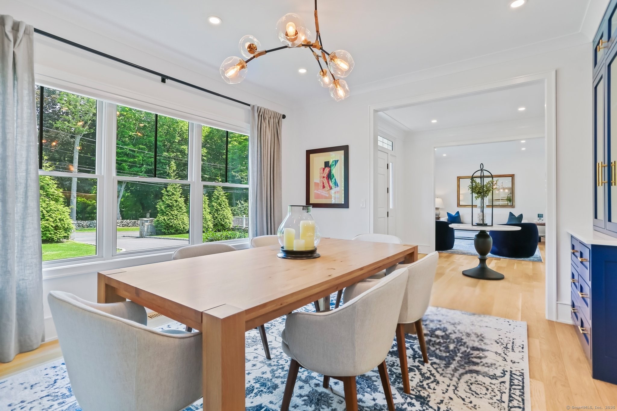 2015 Redding Road Fairfield, CT 06824 - Photo 4 of 40 a view of a dining room with furniture window and outside view
