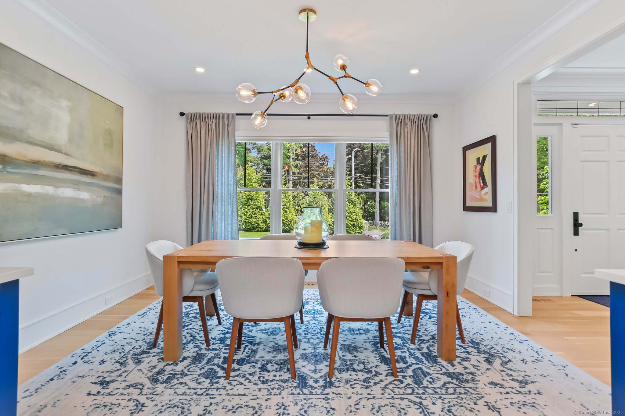 2015 Redding Road Fairfield, CT 06824 - Photo 5 of 40 a view of a dining room with furniture window and wooden floor