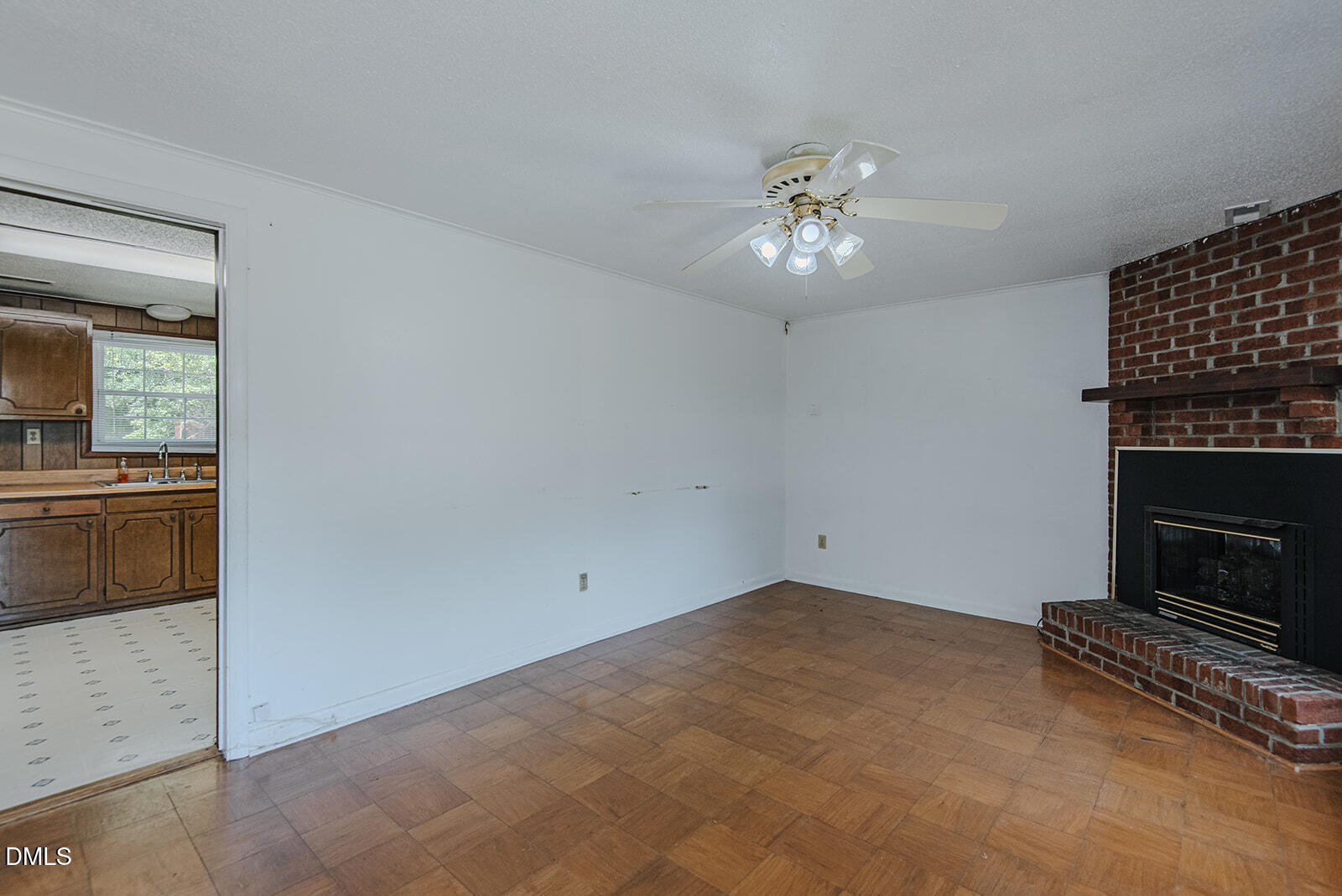 1302 Blacksmith Road Efland, NC 27243 - Photo 10 of 46 a view of an empty room with a kitchen