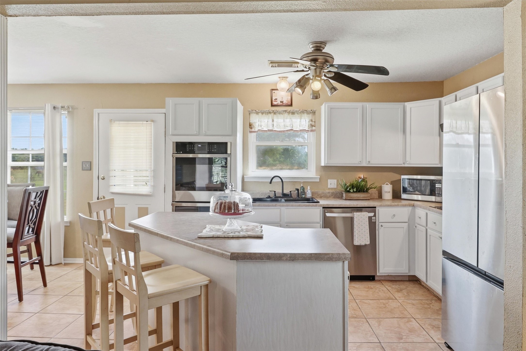 2325 Skrivanek Road Sealy, TX 77474 - Photo 20 of 36 a kitchen with a table chairs stove and cabinets