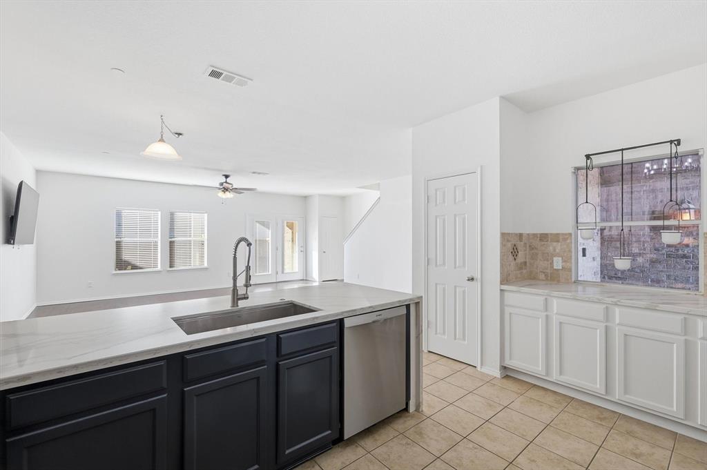 6000 Lost Valley Drive The Colony, TX 75056 - Photo 13 of 40 a spacious bathroom with a granite countertop sink a mirror and a